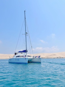 P’tit Bayou devant la dune du Pilat | location de catamaran de croisière sur le bassin d’Arcachon